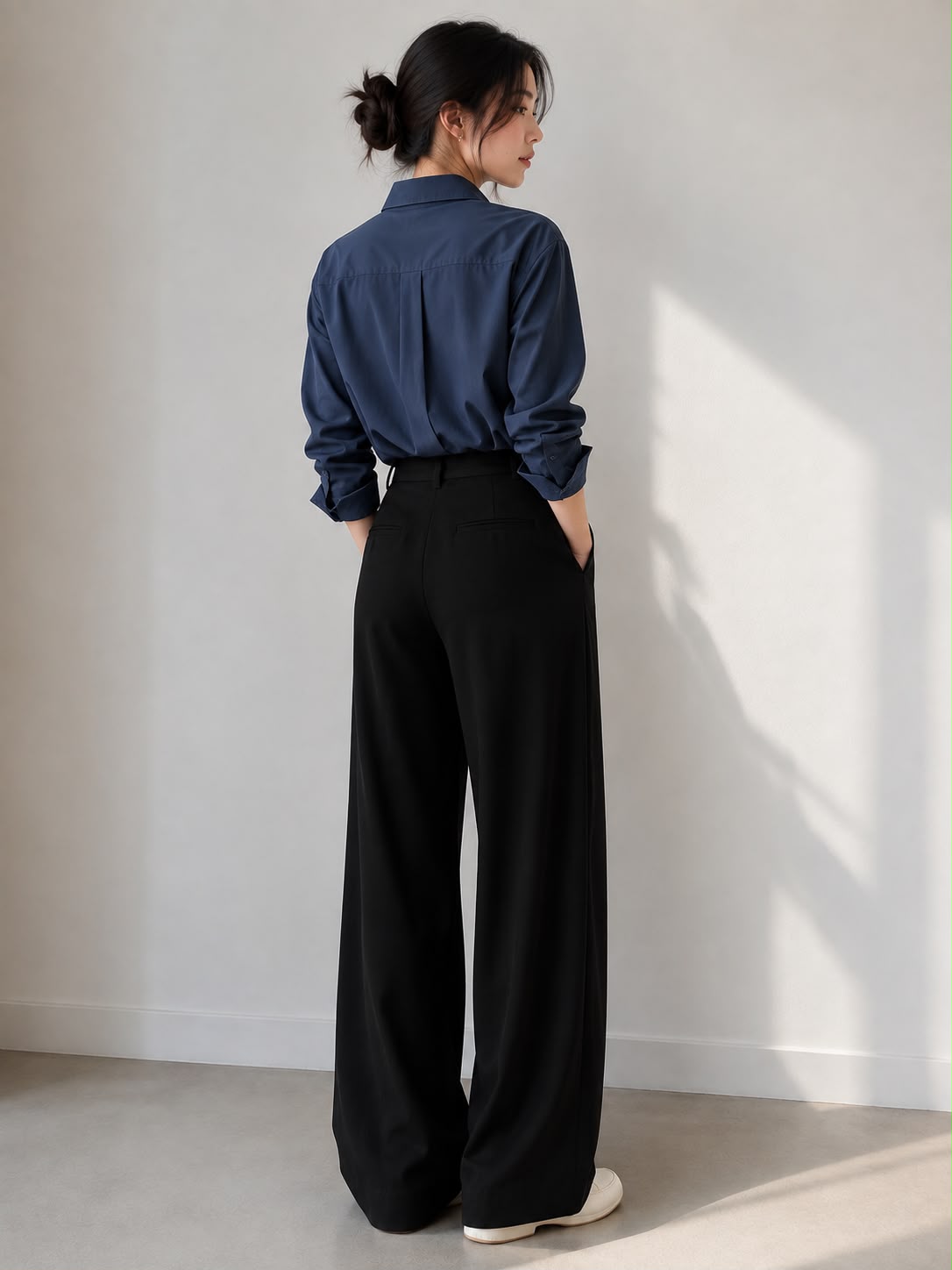 Midnight Navy — back view of the Everyday Oversized Shirt with black wide-leg trousers