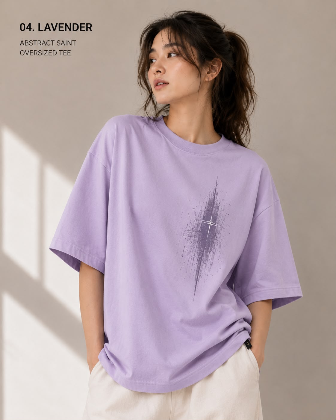 Wisteria — model in the Abstract Saint oversized tee, front view in daylight