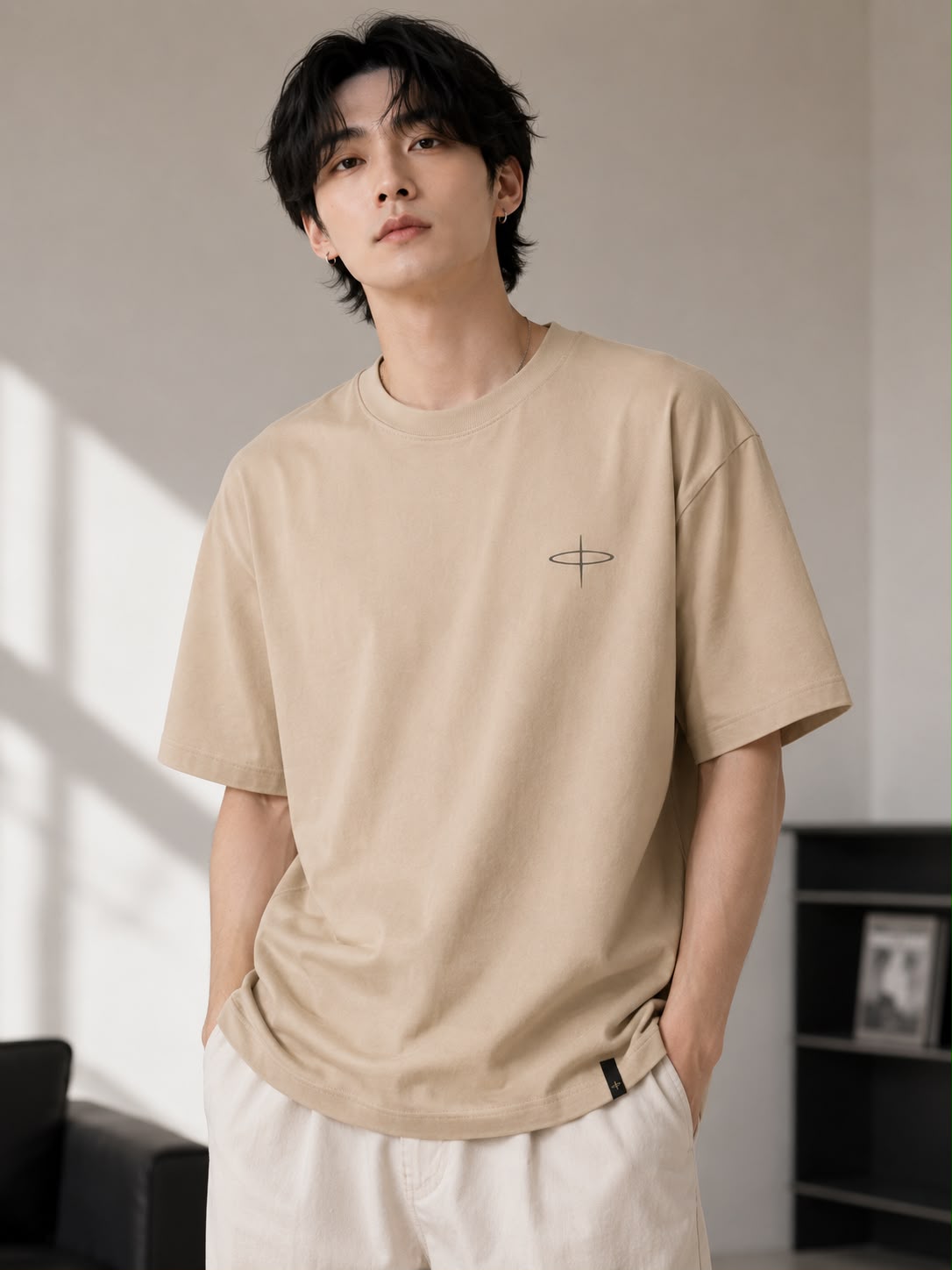 Taupe Beige — model wearing the Oversized Graphic T-Shirt, front view